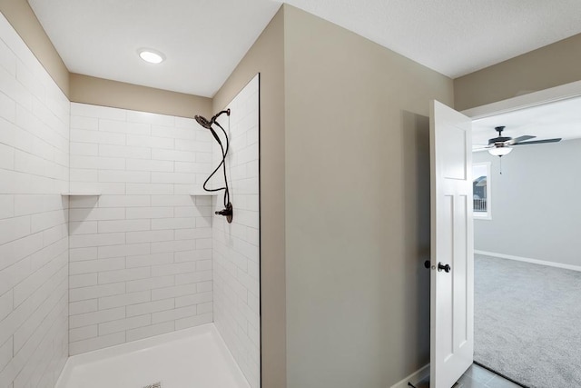 7773 Gunner Dr, Clear Lake, MN 55319 - full bathroom featuring a tile shower, a ceiling fan, and baseboards