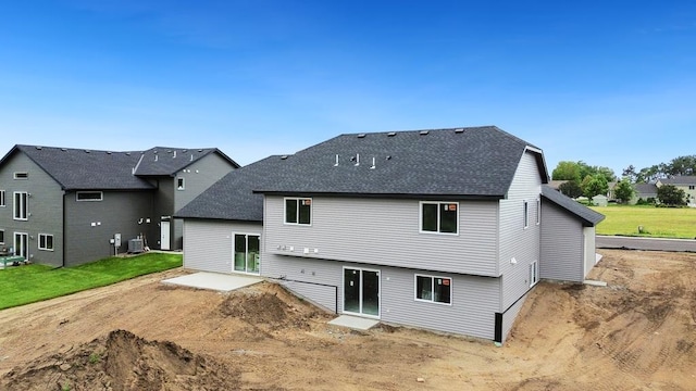 7773 Gunner Dr, Clear Lake, MN 55319 - rear view of house with roof with shingles and central air condition unit