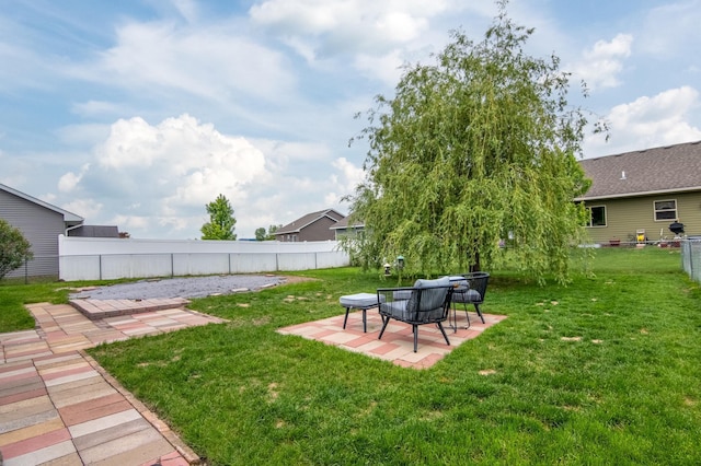 411 Ladd Ln, Osceola, WI 54020 - fenced backyard with a patio area