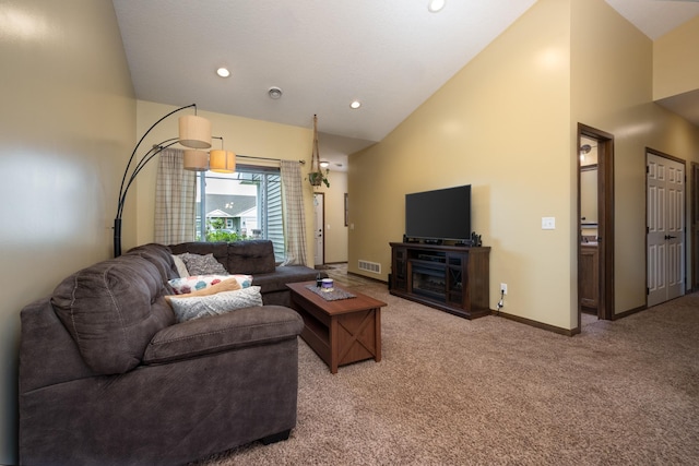411 Ladd Ln, Osceola, WI 54020 - living area with vaulted ceiling, light carpet, and recessed lighting