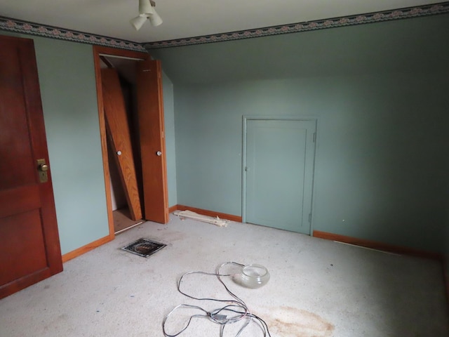 529 1st St N, Truman, MN 56088 - carpeted spare room featuring baseboards