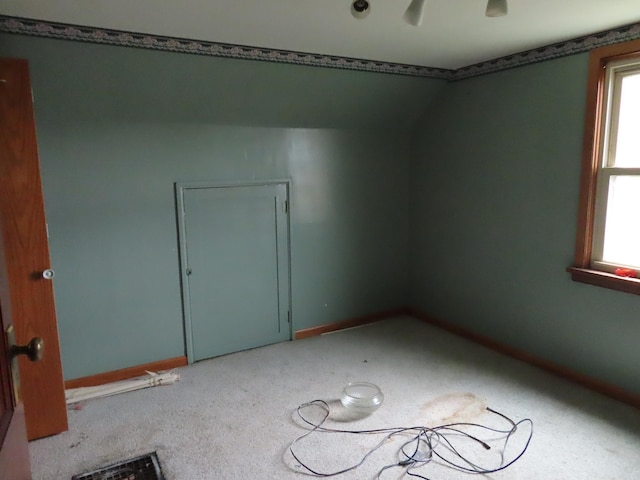 529 1st St N, Truman, MN 56088 - carpeted empty room with baseboards