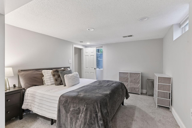 2505 Florida Ave N, Golden Valley, MN 55427 - bedroom featuring carpet, multiple windows, a textured ceiling, baseboards, and recessed lighting