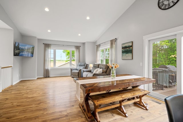 975 100th St NE, Monticello Twp, MN 55362 - living area featuring light wood-style floors, recessed lighting, high vaulted ceiling, and baseboards