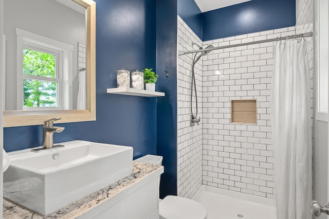 975 100th St NE, Monticello Twp, MN 55362 - bathroom with a shower stall, vanity, and toilet