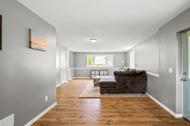 975 100th St NE, Monticello Twp, MN 55362 - living area with wood finished floors and baseboards