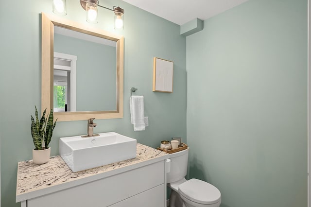 975 100th St NE, Monticello Twp, MN 55362 - bathroom with toilet and vanity