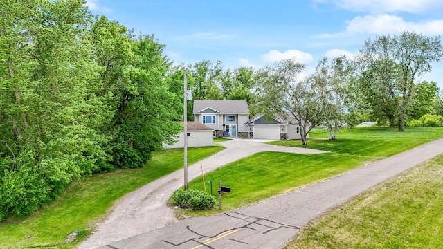 975 100th St NE, Monticello Twp, MN 55362 - view of front facade with dirt driveway, a front lawn, and a garage