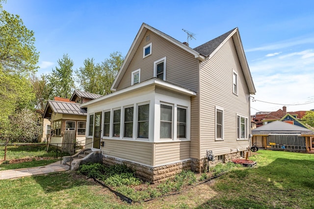 2745 Columbus Ave, Minneapolis, MN 55407 - view of side of property with entry steps and a gazebo
