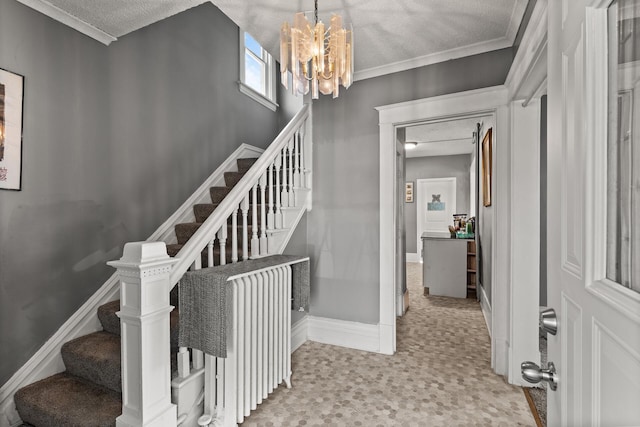 2745 Columbus Ave, Minneapolis, MN 55407 - stairway featuring a chandelier, a textured ceiling, and baseboards