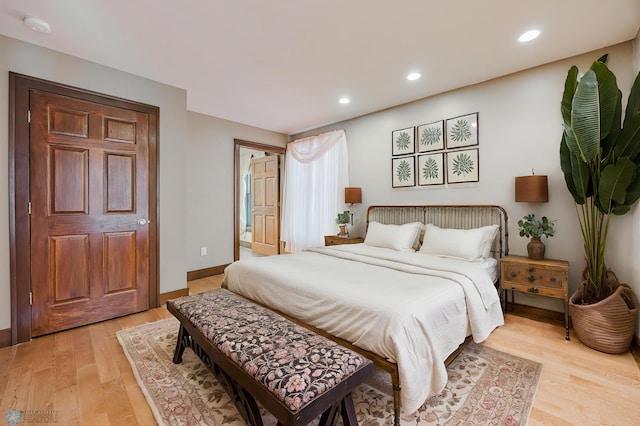 8416 141st Ave SE, Milnor, ND 58060 - bedroom with light wood-style floors, recessed lighting, and baseboards