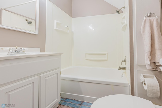 8416 141st Ave SE, Milnor, ND 58060 - full bathroom featuring toilet, vanity, and washtub / shower combination