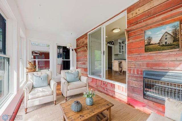 8416 141st Ave SE, Milnor, ND 58060 - sunroom / solarium featuring plenty of natural light and a fireplace