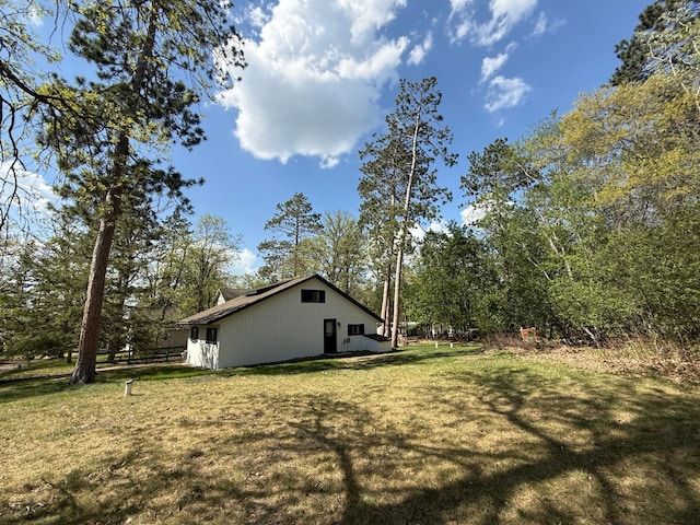 4231 Teal Ln NE, Bemidji, MN 56601 - view of property exterior featuring a lawn