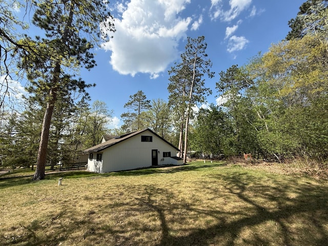 4231 Teal Ln NE, Bemidji, MN 56601 - view of property exterior featuring a lawn
