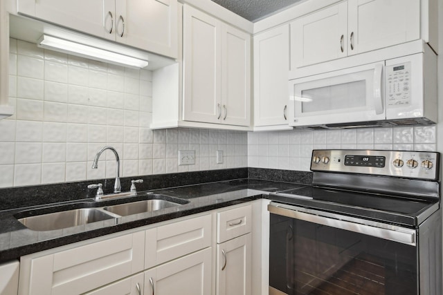 4311 Pond View Dr, White Bear Twp, MN 55110 - kitchen with white microwave, stainless steel electric range oven, a sink, and white cabinets