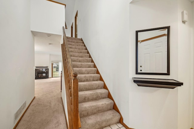 4311 Pond View Dr, White Bear Twp, MN 55110 - stairway with carpet and baseboards