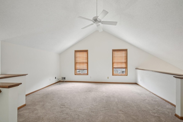 4311 Pond View Dr, White Bear Twp, MN 55110 - additional living space featuring carpet flooring, ceiling fan, vaulted ceiling, and baseboards