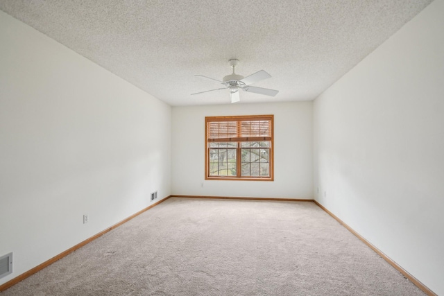 4311 Pond View Dr, White Bear Twp, MN 55110 - unfurnished room featuring carpet floors, a ceiling fan, baseboards, and a textured ceiling