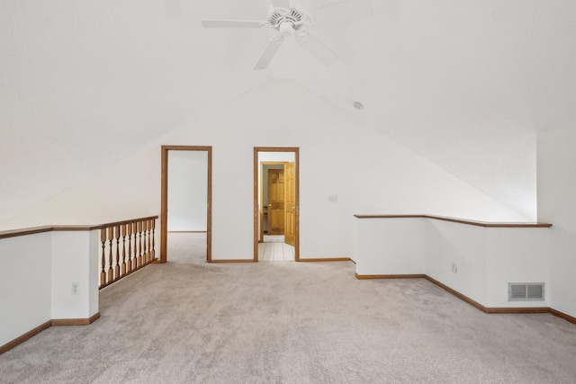 4311 Pond View Dr, White Bear Twp, MN 55110 - empty room featuring carpet floors, vaulted ceiling, ceiling fan, and baseboards
