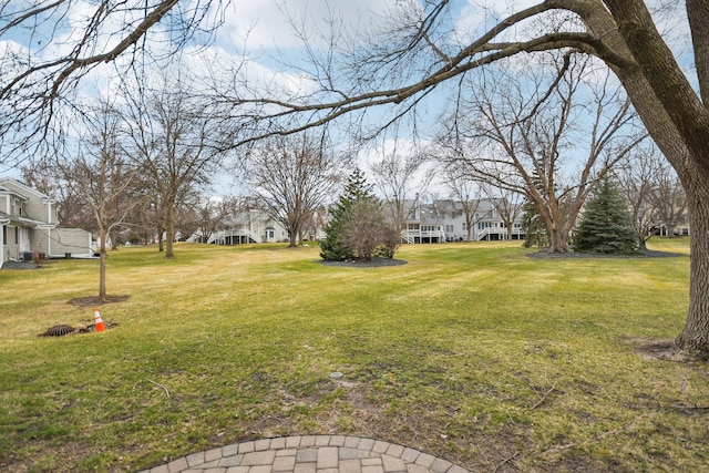 4311 Pond View Dr, White Bear Twp, MN 55110 - view of grassy yard with a residential view