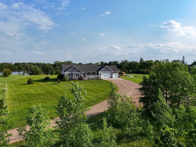29506 435th Ave, Ottertail, MN 56571 - view of front of house featuring dirt driveway, an attached garage, and a front yard