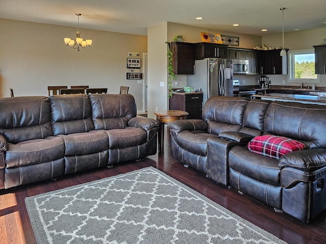 29506 435th Ave, Ottertail, MN 56571 - living area with a chandelier, dark wood-style flooring, and recessed lighting