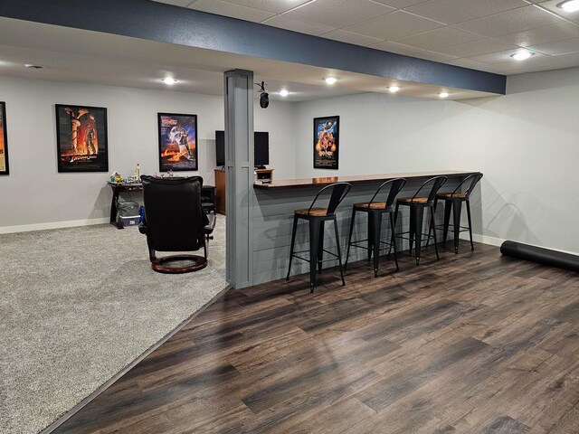 29506 435th Ave, Ottertail, MN 56571 - indoor dry bar with baseboards, wood finished floors, a drop ceiling, and recessed lighting