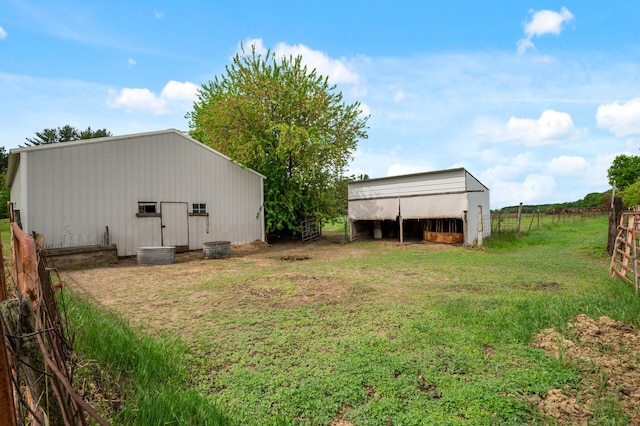 28748 Palm St NW, Isanti, MN 55040 - view of yard featuring an outbuilding and an outdoor structure