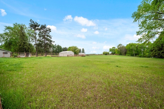 28748 Palm St NW, Isanti, MN 55040 - view of yard featuring a view of countryside and an outdoor structure