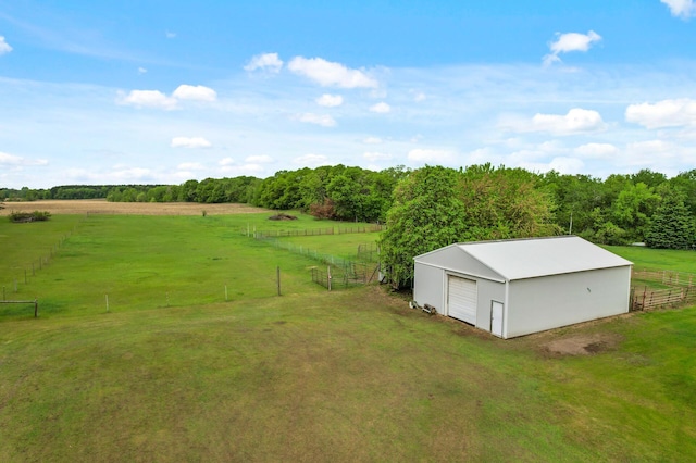 28748 Palm St NW, Isanti, MN 55040 - view of yard featuring a view of rural / pastoral area, an outdoor structure, and a garage