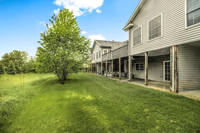 15229 Cobalt St NW, Ramsey, MN 55303 - view of grassy yard featuring a patio