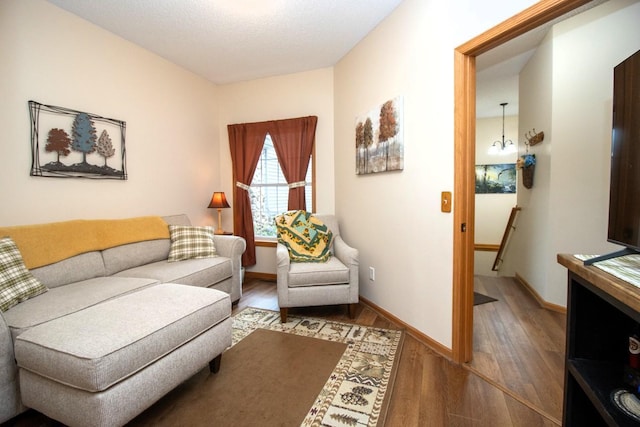 15229 Cobalt St NW, Ramsey, MN 55303 - living area featuring wood finished floors and baseboards