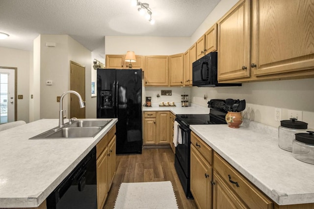 15229 Cobalt St NW, Ramsey, MN 55303 - kitchen with black appliances, a sink, dark wood-style floors, light countertops, and a textured ceiling