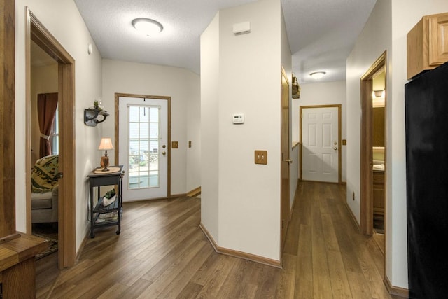 15229 Cobalt St NW, Ramsey, MN 55303 - entrance foyer featuring wood finished floors and baseboards