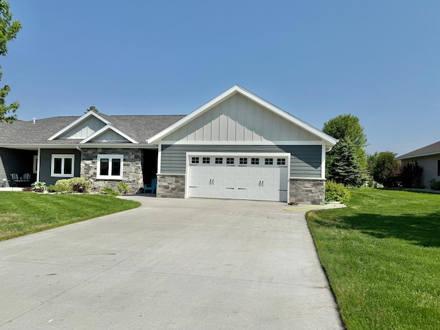 910 Lake Forest Cir, Detroit Lakes, MN 56501 - craftsman house with stone siding, board and batten siding, a front yard, and an attached garage