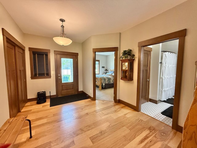 910 Lake Forest Cir, Detroit Lakes, MN 56501 - entrance foyer featuring light wood finished floors and baseboards