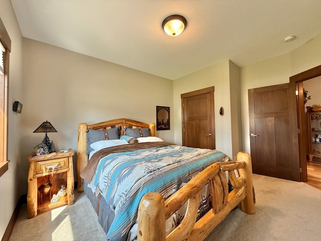 910 Lake Forest Cir, Detroit Lakes, MN 56501 - bedroom featuring light colored carpet