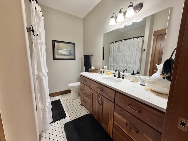 910 Lake Forest Cir, Detroit Lakes, MN 56501 - full bathroom with vanity, toilet, baseboards, and a shower with shower curtain