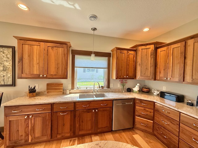910 Lake Forest Cir, Detroit Lakes, MN 56501 - kitchen featuring dishwasher, a sink, light wood-type flooring, brown cabinetry, and recessed lighting