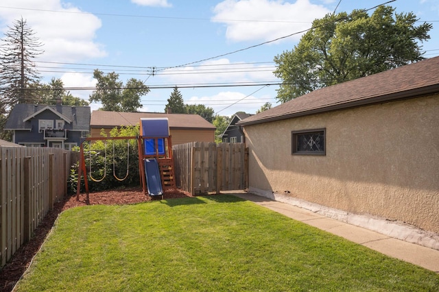 3638 Van Buren St NE, Minneapolis, MN 55418 - fenced backyard with a playground