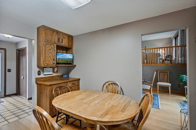 4781 Zealand Ave N, New Hope, MN 55428 - dining space featuring light wood-style floors and baseboards