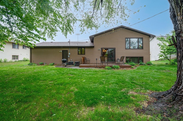 4781 Zealand Ave N, New Hope, MN 55428 - back of property with a deck and a lawn