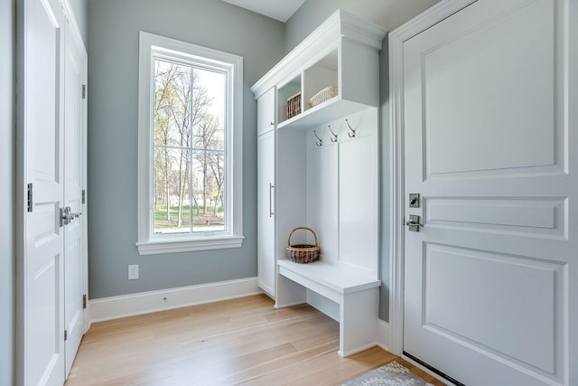 677 Shawnee Woods Rd, Medina, MN 55340 - mudroom featuring light wood finished floors and baseboards