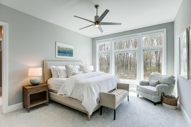 677 Shawnee Woods Rd, Medina, MN 55340 - bedroom featuring light carpet, baseboards, and a ceiling fan