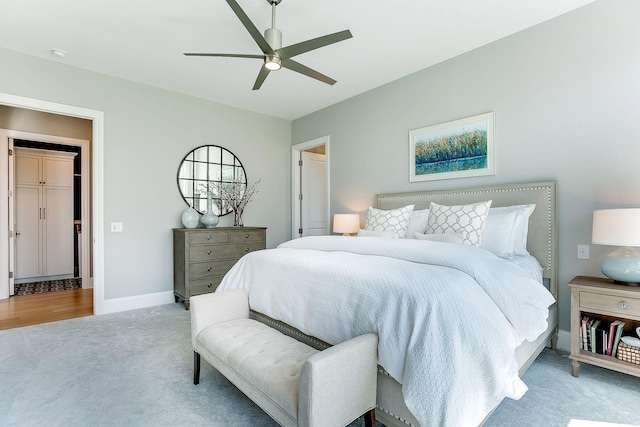 677 Shawnee Woods Rd, Medina, MN 55340 - carpeted bedroom featuring baseboards and a ceiling fan