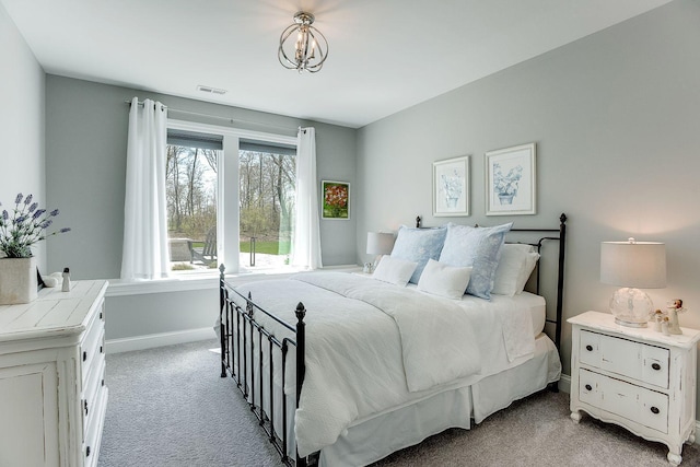 677 Shawnee Woods Rd, Medina, MN 55340 - bedroom with light colored carpet and baseboards