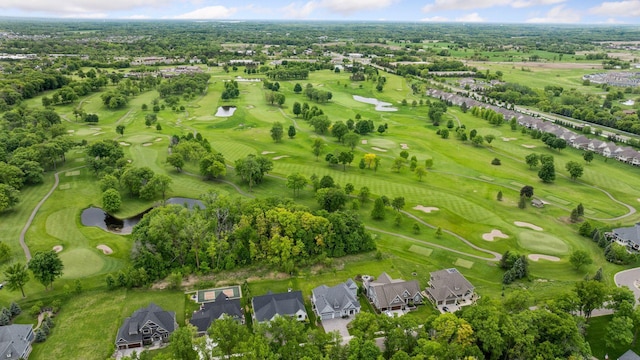 677 Shawnee Woods Rd, Medina, MN 55340 - aerial view of property and surrounding area with a nearby body of water, nearby suburban area, a golf course, and a tree filled landscape