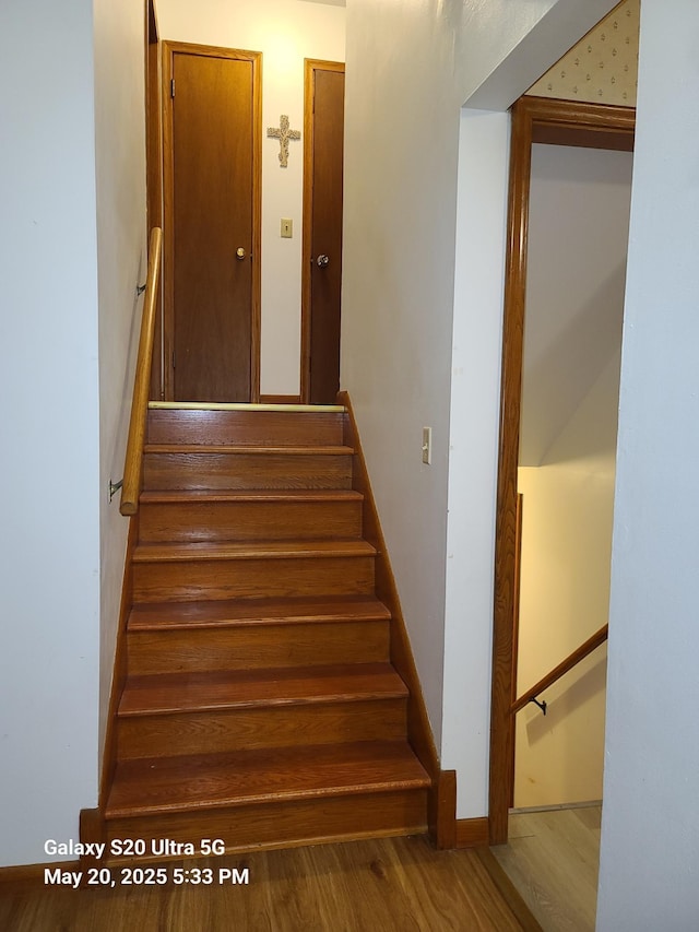 7036 Regent Ave N, Brooklyn Center, MN 55429 - stairway featuring wood finished floors