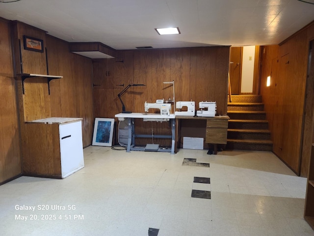 7036 Regent Ave N, Brooklyn Center, MN 55429 - finished basement with wooden walls, stairs, and light flooring